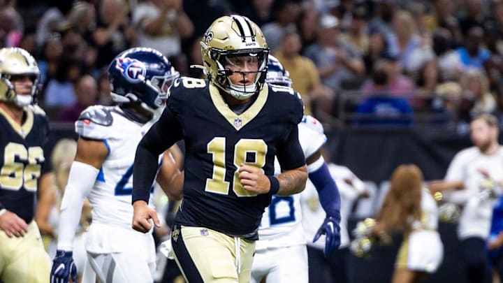 New Orleans Saints quarterback Spencer Rattler reacts to passing a touchdown against the Tennessee Titans.