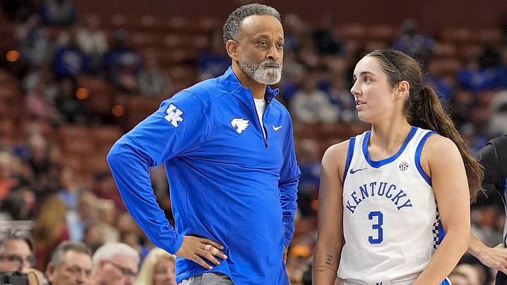 Mar 7, 2025; Greenville, SC, USA; Kentucky Wildcats head coach Kenny Brooks talks with guard Georgia Amoore (3) during a free throw against the Oklahoma Sooners during the second half at Bon Secours Wellness Arena. Mandatory Credit: Jim Dedmon-Imagn Images Mar 7, 2025; Greenville, SC, USA; Kentucky Wildcats head coach Kenny Brooks talks with guard Georgia Amoore (3) during a free throw against the Oklahoma Sooners during the second half at Bon Secours Wellness Arena. Mandatory Credit: Jim Dedmon-Imagn Images