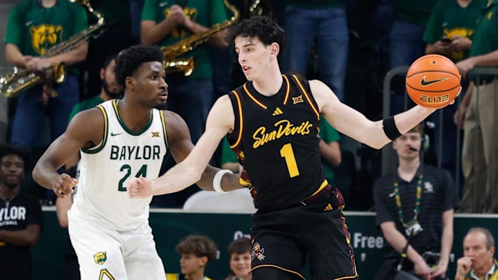 Feb 21, 2026; Waco, Texas, USA; Arizona State Sun Devils forward Santiago Trouet (1) controls the ball as Baylor Bears guard Tounde Yessoufou (24) defends during the second half at Paul and Alejandra Foster Pavilion. Mandatory Credit: Chris Jones-Imagn Images
