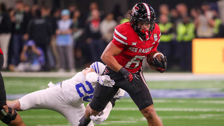 Texas Tech's Cameron Dickey runs with the ball against BYU during the Big 12 Conference championship football game, Saturday, Nov. 6, 2025, at AT&T Stadium in Arlington.