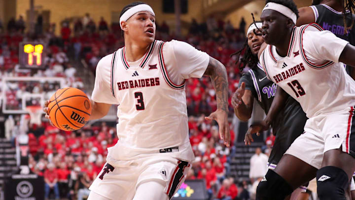 Texas Tech's LeJuan Watts dribbles against Kansas State during a Big 12 Conference men's basketball game, Saturday, Feb. 21, 2026, in United Supermarkets Arena. Texas Tech's LeJuan Watts dribbles against Kansas State during a Big 12 Conference men's basketball game, Saturday, Feb. 21, 2026, in United Supermarkets Arena.
