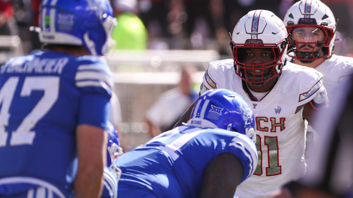 Texas Tech's David Bailey eyes BYU quarterback Bear Bachmeier before a snap in a Big 12 Conference football game, Saturday, Nov. 8, 2025, at Jones AT&T Stadium.