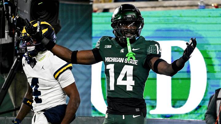 Michigan State's Malcolm Bell, right, reacts after getting called for pass interference against Michigan's Andrew Marsh during the first quarter on Saturday, Oct. 25, 2025, at Spartan Stadium in East Lansing. Michigan State's Malcolm Bell, right, reacts after getting called for pass interference against Michigan's Andrew Marsh during the first quarter on Saturday, Oct. 25, 2025, at Spartan Stadium in East Lansing.