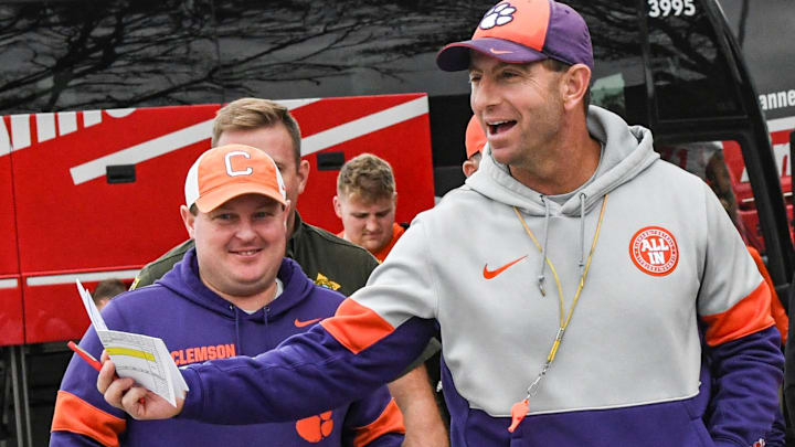 Clemson head coach Dabo Swinney and defensive coordinator Wes Goodwin arrive off the bus before football team practice before the TaxSlayer Gator Bowl at Fernandina Beach High School in Jacksonville, Florida, Wednesday, December 27, 2023.