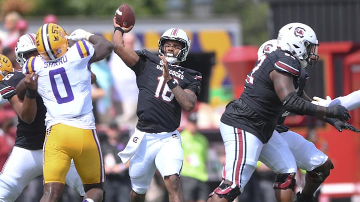South Carolina quarterback LaNorris Sellers (16) passes near Louisiana State University defensive end Paris Shand (0) during the first quarter at Williams-Brice Stadium in Columbia, S.C. Saturday, September 14, 2024.