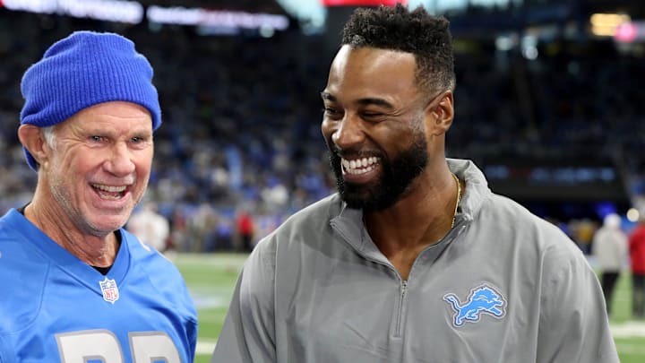 Red Hot Chili Peppers drummer Chad Smith and Lions great Calvin Johnson before the NFC divisional playoff game 