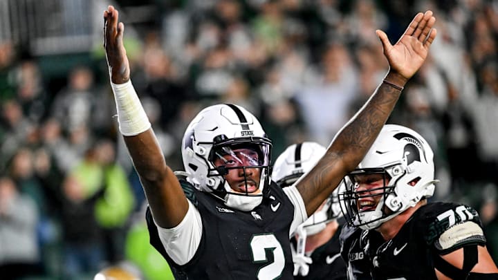 Michigan State's Aidan Chiles celebrates his rushing touchdown against Boston College during the second overtime on Saturday, Sept. 6, 2025, at Spartan Stadium in East Lansing. Michigan State's Aidan Chiles celebrates his rushing touchdown against Boston College during the second overtime on Saturday, Sept. 6, 2025, at Spartan Stadium in East Lansing.