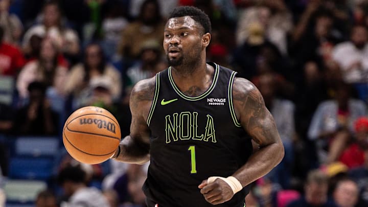 Mar 29, 2026; New Orleans, Louisiana, USA;  New Orleans Pelicans forward Zion Williamson (1) brings the ball up court against the Houston Rockets during the first half at Smoothie King Center. 