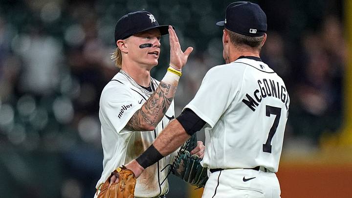 Detroit Tigers center fielder Max Clark (15) high-fives third baseman Kevin McGonigle (7) to celebrate. Detroit Tigers center fielder Max Clark (15) high-fives third baseman Kevin McGonigle (7) to celebrate.