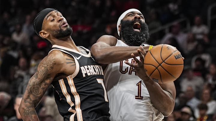 Apr 10, 2026; Atlanta, Georgia, USA; Cleveland Cavaliers guard James Harden (1) is defended by Atlanta Hawks guard Nickeil Alexander-Walker (7) during the second half at State Farm Arena. Mandatory Credit: Dale Zanine-Imagn Images