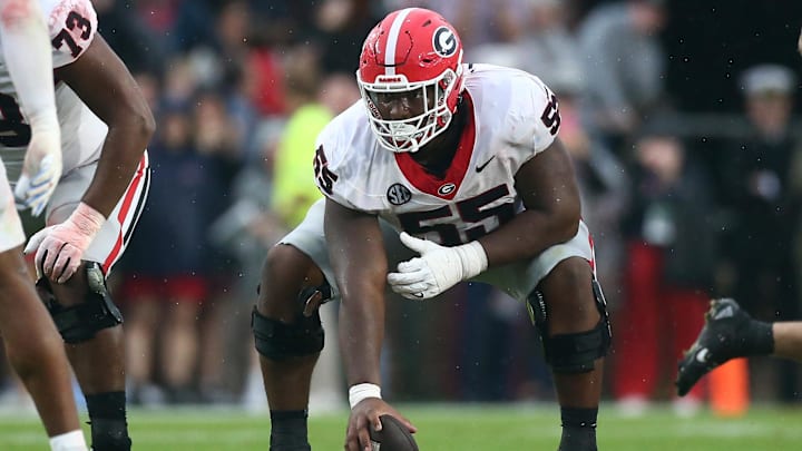 Nov 9, 2024; Oxford, Mississippi, USA; Georgia Bulldogs offensive lineman Jared Wilson (55) prepares to snap the ball during the first half against the Mississippi Rebels at Vaught-Hemingway Stadium. Mandatory Credit: Petre Thomas-Imagn Images