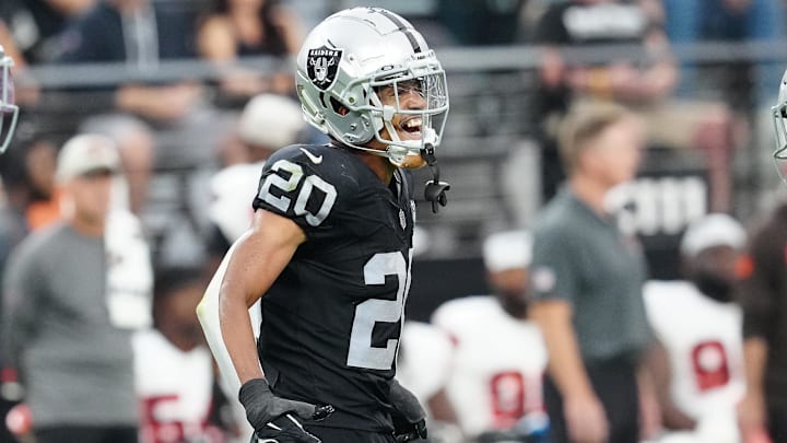 Sep 29, 2024; Paradise, Nevada, USA; Las Vegas Raiders safety Isaiah Pola-Mao (20) celebrates after getting a sack against the Cleveland Browns during the third quarter at Allegiant Stadium. Mandatory Credit: Stephen R. Sylvanie-Imagn Images