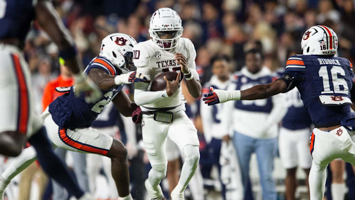 Texas A&M Aggies quarterback Marcel Reed (10) runs the ball against the Auburn Tigers at Jordan-Hare Stadium in Auburn, Ala., on Saturday, Sept. 7, 2024. Texas A&M Aggies quarterback Marcel Reed (10) runs the ball against the Auburn Tigers at Jordan-Hare Stadium in Auburn, Ala., on Saturday, Sept. 7, 2024.