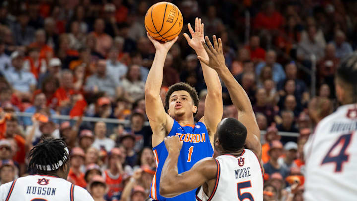 Florida Gators guard Walter Clayton Jr. (1) takes a jump shot as Auburn Tigers take on Florida Gators at Neville Arena in Auburn, Ala., on Saturday, Feb. 8, 2025. Florida Gators lead Auburn Tigers 48-38 at halftime.