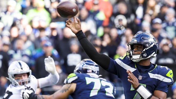 Nov 27, 2022; Seattle, Washington, USA; Seattle Seahawks quarterback Geno Smith (7) passes against the Las Vegas Raiders during the second quarter at Lumen Field. Mandatory Credit: Joe Nicholson-Imagn Images