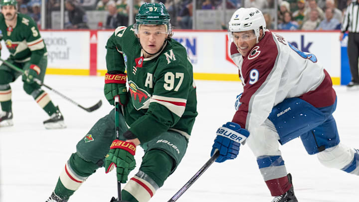 Apr 4, 2024; Saint Paul, Minnesota, USA; Minnesota Wild left wing Kirill Kaprizov (97) and Colorado