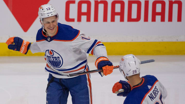 Feb 11, 2023; Ottawa, Ontario, CAN; Edmonton Oilers right wing Jesse Puljujarvi (13) celebrates his goal scored against the Ottawa Senators in the third period at the Canadian Tire Centre. Mandatory Credit: Marc DesRosiers-Imagn Images
