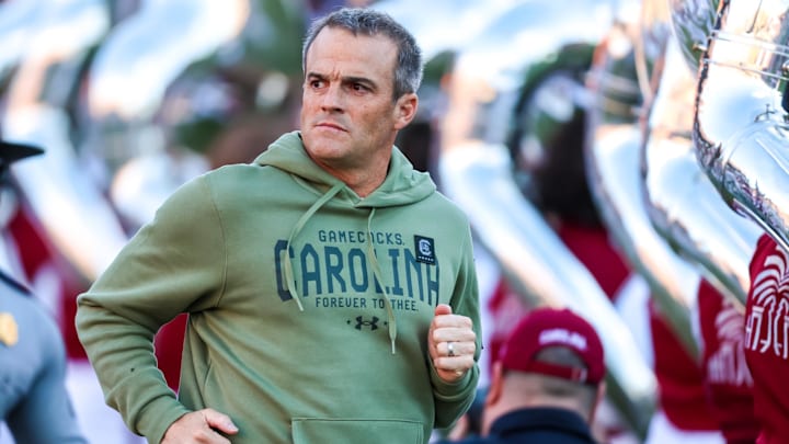 Nov 23, 2024; Columbia, South Carolina, USA; South Carolina Gamecocks head coach Shane Beamer takes the field with his team before a game against the Wofford Terriers at Williams-Brice Stadium. Mandatory Credit: Jeff Blake-Imagn Images