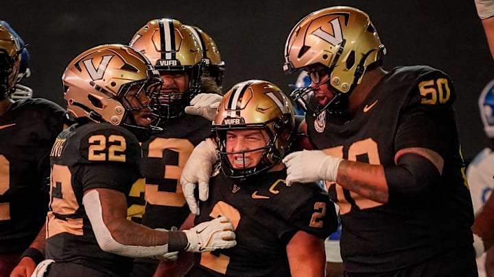 Vanderbilt quarterback Diego Pavia (2) celebrates his touchdown against Kentucky during the third quarter at FirstBank Stadium in Nashville, Tenn., Saturday, Nov. 22, 2025.