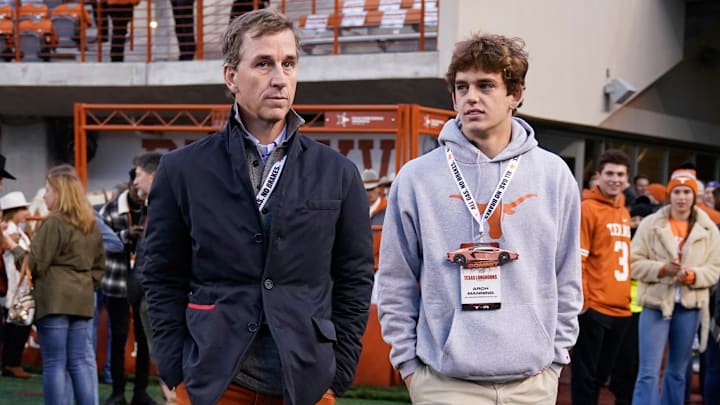 Nov 12, 2022; Austin, Texas, USA; Texas Longhorns quarterback recruit Arch Manning along with his father Cooper Manning on the sidelines before the game against the Texas Christian Horned Frogs at Darrell K Royal-Texas Memorial Stadium. Mandatory Credit: Scott Wachter-Imagn Images
