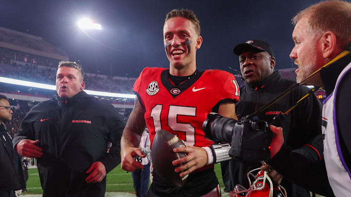Georgia Bulldogs quarterback Carson Beck celebrates after a victory over the Tennessee Volunteers. Georgia Bulldogs quarterback Carson Beck celebrates after a victory over the Tennessee Volunteers.