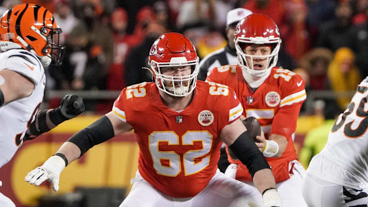 Jan 29, 2023; Kansas City, Missouri, USA; Kansas City Chiefs guard Joe Thuney (62) prepares to block as quarterback Patrick Mahomes (15) takes the snap against the Cincinnati Bengals during the AFC Championship game at GEHA Field at Arrowhead Stadium. Mandatory Credit: Denny Medley-Imagn Images