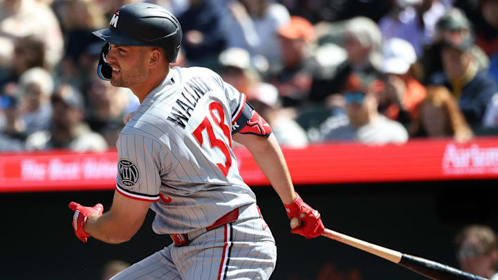 Mar 29, 2026; Baltimore, Maryland, USA; Minnesota Twins right fielder Matt Wallner (38) hits a single during the second inning against the Baltimore Orioles at Oriole Park at Camden Yards.