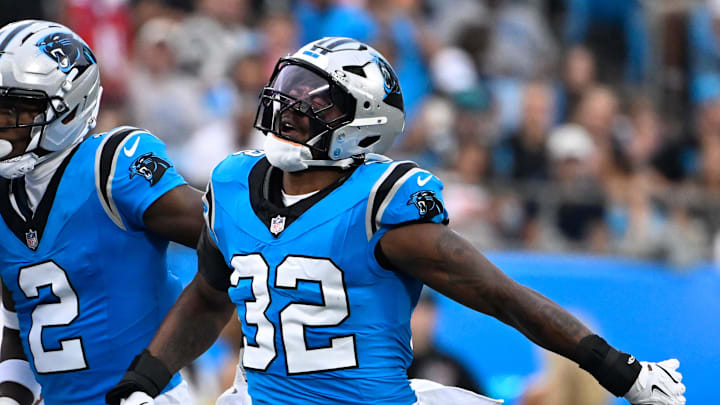 Aug 8, 2025; Charlotte, North Carolina, USA; Carolina Panthers linebacker Trevin Wallace (32) reacts in the first quarter at Bank of America Stadium. Mandatory Credit: Bob Donnan-Imagn Images