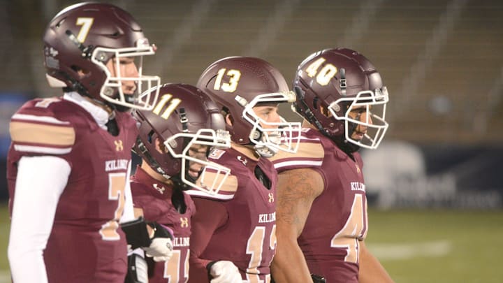 Killingly captains Quinn Sumner, Aiden LaMotte, Ryan Webster, and Anthony Oates