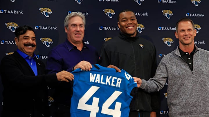 Jaguars owner Shad Khan, head coach Doug Pederson, first-round draft pick Travon Walker and general