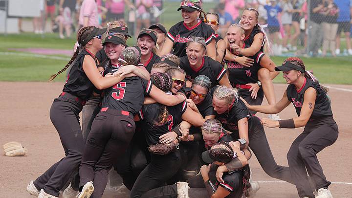 Willimsburg softball players celebrate after winning 3-2 over Wahlert Catholic in the Class 3A state softball championship game at Rogers Sports Complex on July 25, 2025, in Fort Dodge, Iowa.
