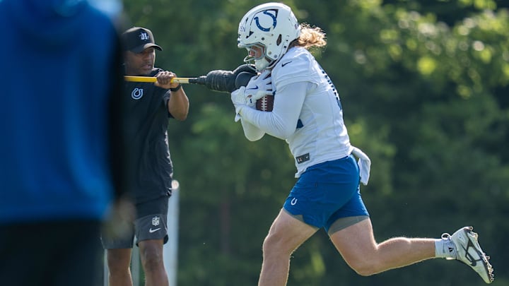 Indianapolis Colts tight end Tyler Warren (84) works through pass catching drills Thursday, July 24, 2025, during training camp held at Grand Park in Westfield.