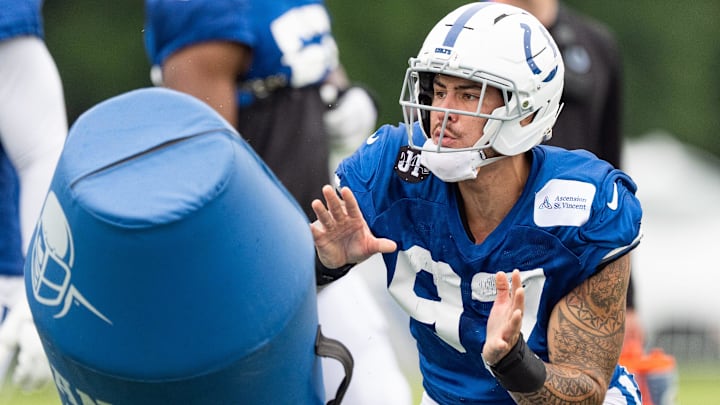 Indianapolis Colts defensive end Laiatu Latu (97) works through a drill Monday, July 28, 2025, during training camp held at Grand Park in Westfield. Indianapolis Colts defensive end Laiatu Latu (97) works through a drill Monday, July 28, 2025, during training camp held at Grand Park in Westfield.