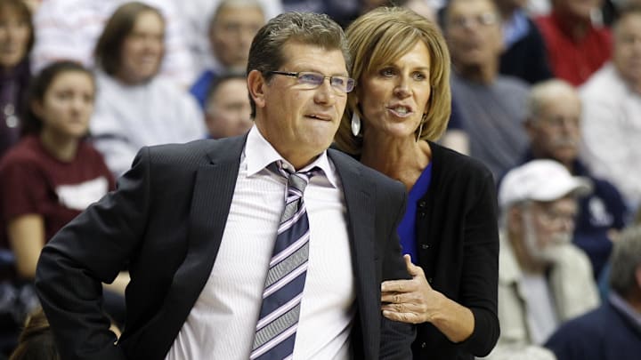 Dec 6, 2012; Storrs, CT, USA; Connecticut Huskies head coach Geno Auriemma (left) reacts on the sideline with associate head coach Chris Dailey as they take on the Penn State Lady Lions during the second half at Gampel Pavilion. UConn defeated the Lady Lions 67-52. Mandatory Credit: David Butler II-Imagn Images