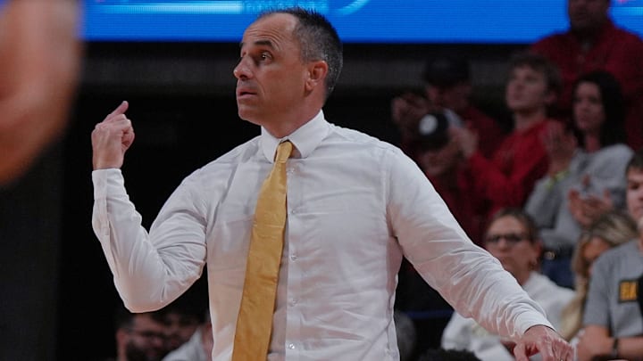 Iowa Hawkeyes head coach Ben McCollum Iowa Hawkeyes head coach Ben McCollum