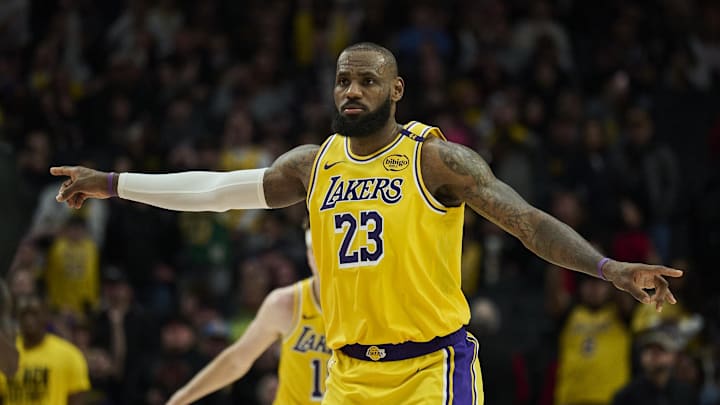 Feb 20, 2025; Portland, Oregon, USA; Los Angeles Lakers forward LeBron James (23) signals to teammates during the second half against the Portland Trail Blazers at Moda Center. Mandatory Credit: Troy Wayrynen-Imagn Images