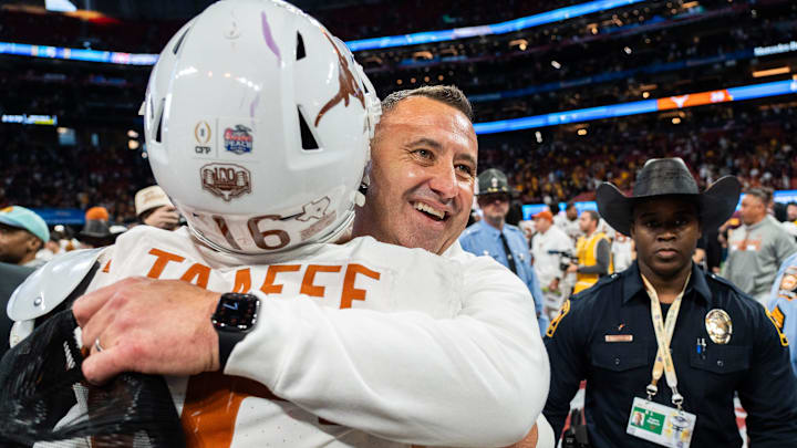 Texas Longhorns head coach Steve Sarkisian embraces Texas Longhorns defensive back Michael Taaffe (16) as they celebrate their win in the Peach Bowl College Football Playoff quarterfinal against Arizona State at Mercedes-Benz Stadium in Atlanta, Georgia, Jan. 1, 2025. Texas Longhorns head coach Steve Sarkisian embraces Texas Longhorns defensive back Michael Taaffe (16) as they celebrate their win in the Peach Bowl College Football Playoff quarterfinal against Arizona State at Mercedes-Benz Stadium in Atlanta, Georgia, Jan. 1, 2025.