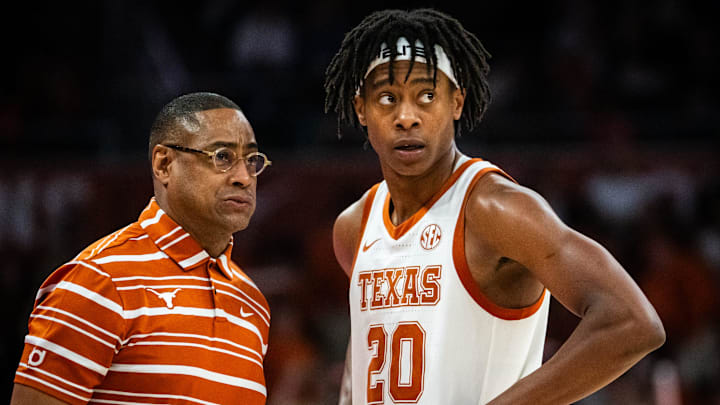 Texas Longhorns head coach Rodney Terry speaks with guard Tre Johnson (20) during a break in the second half of the Longhorns' game against the Chicago State Cougars at the Moody Center in Austin, Nov. 12, 2024.