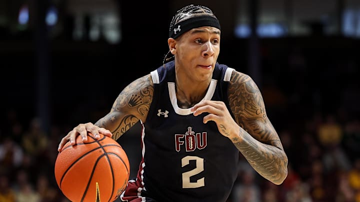 Dec 21, 2024; Minneapolis, Minnesota, USA; Fairleigh Dickinson Knights guard Terrence Brown (2) dribbles during the second half against the Minnesota Golden Gophers at Williams Arena. Mandatory Credit: Matt Krohn-Imagn Images