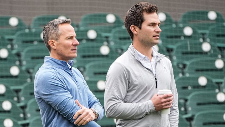 Detroit Tigers team owner Chris Ilitch, left, talks to president of baseball operation Scott Harris as they watch batting practice during spring training at Joker Marchant Stadium in Lakeland, Fla. on Thursday, Feb. 20, 2025. Detroit Tigers team owner Chris Ilitch, left, talks to president of baseball operation Scott Harris as they watch batting practice during spring training at Joker Marchant Stadium in Lakeland, Fla. on Thursday, Feb. 20, 2025.