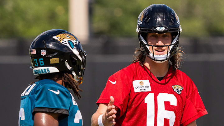 Jacksonville Jaguars running back LeQuint Allen (36) takes with Jacksonville Jaguars quarterback Trevor Lawrence (16) after an NFL training camp seventh session at the Miller Electric Center, Thursday, July 31, 2025, in Jacksonville, Fla. Jacksonville Jaguars running back LeQuint Allen (36) takes with Jacksonville Jaguars quarterback Trevor Lawrence (16) after an NFL training camp seventh session at the Miller Electric Center, Thursday, July 31, 2025, in Jacksonville, Fla.