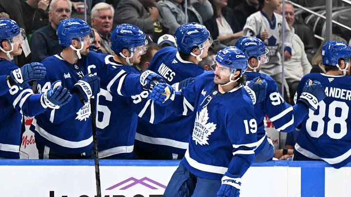 Sep 23, 2026; Toronto, Ontario, CAN; Toronto Maple Leafs forward Zack MacEwen (19) celebrates with team mates at the bench after scoring a goal against the Ottawa Senators in the second period at Scotiabank Arena. Mandatory Credit: Dan Hamilton-Imagn Images Sep 23, 2026; Toronto, Ontario, CAN; Toronto Maple Leafs forward Zack MacEwen (19) celebrates with team mates at the bench after scoring a goal against the Ottawa Senators in the second period at Scotiabank Arena. Mandatory Credit: Dan Hamilton-Imagn Images