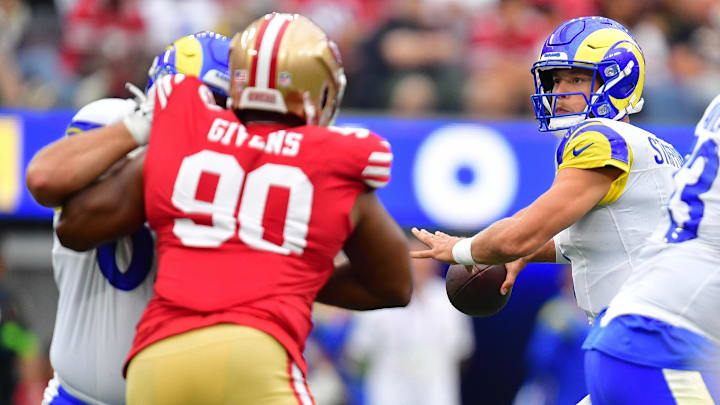 Sep 17, 2023; Inglewood, California, USA; Los Angeles Rams quarterback Matthew Stafford (9) drops back to pass against the San Francisco 49ers during the first half at SoFi Stadium. Mandatory Credit: Gary A. Vasquez-Imagn Images