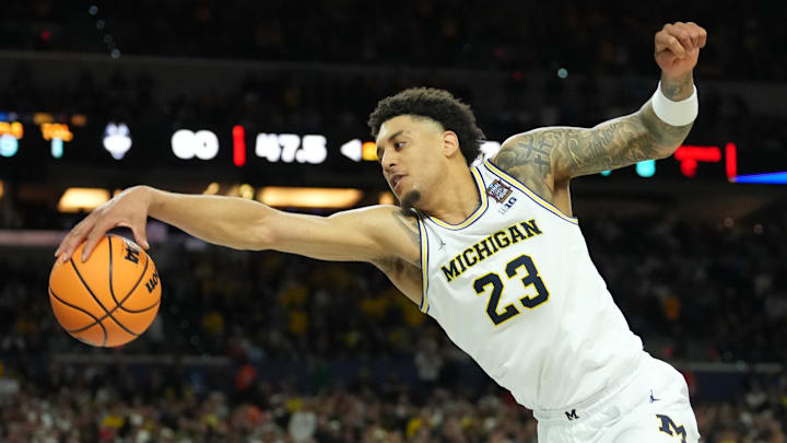 Apr 6, 2026; Indianapolis, IN, USA; Michigan Wolverines forward Yaxel Lendeborg (23) in action against the Connecticut Huskies in the second half during the national championship of the Final Four of the men's 2026 NCAA Tournament at Lucas Oil Stadium. Mandatory Credit: Robert Deutsch-Imagn Images