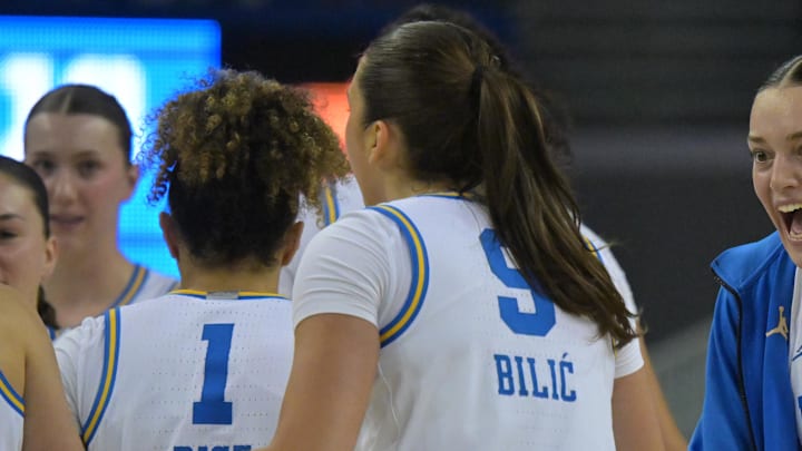 Mar 23, 2026; Los Angeles, CA, USA;  UCLA Bruins forward Angela Dugalic (32) reacts after a three point basket by UCLA Bruins guard Lena Bilic (9) in the first half against the Oklahoma State Cowboys at Pauley Pavilion. Mandatory Credit: Jayne Kamin-Oncea-Imagn Images