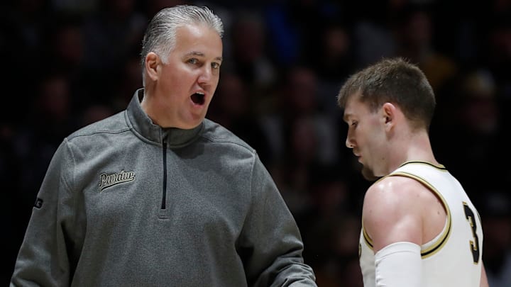 Purdue Boilermakers head coach Matt Painter talks to Purdue Boilermakers guard Braden Smith (3) Purdue Boilermakers head coach Matt Painter talks to Purdue Boilermakers guard Braden Smith (3)