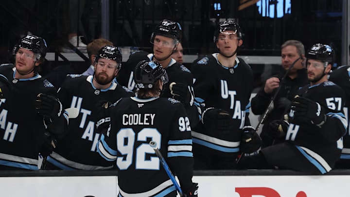 Apr 8, 2025; Salt Lake City, Utah, USA; Utah Hockey Club center Logan Cooley (92) celebrates a power play goal against the Seattle Kraken during the second period at Delta Center. Mandatory Credit: Rob Gray-Imagn Images