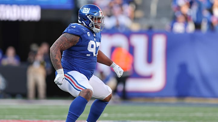 Jan 1, 2023; East Rutherford, New Jersey, USA; New York Giants defensive tackle Dexter Lawrence (97) celebrates a defensive stop during the second half against the Indianapolis Colts at MetLife Stadium. Mandatory Credit: Vincent Carchietta-Imagn Images Jan 1, 2023; East Rutherford, New Jersey, USA; New York Giants defensive tackle Dexter Lawrence (97) celebrates a defensive stop during the second half against the Indianapolis Colts at MetLife Stadium. Mandatory Credit: Vincent Carchietta-Imagn Images