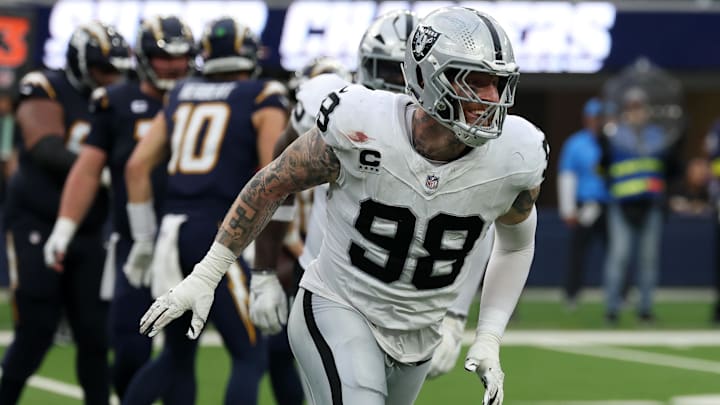 Nov 30, 2025; Inglewood, California, USA; Las Vegas Raiders defensive end Maxx Crosby (98) reacts after a tackle against the Los Angeles Chargers during the second half at SoFi Stadium. Mandatory Credit: Kiyoshi Mio-Imagn Images