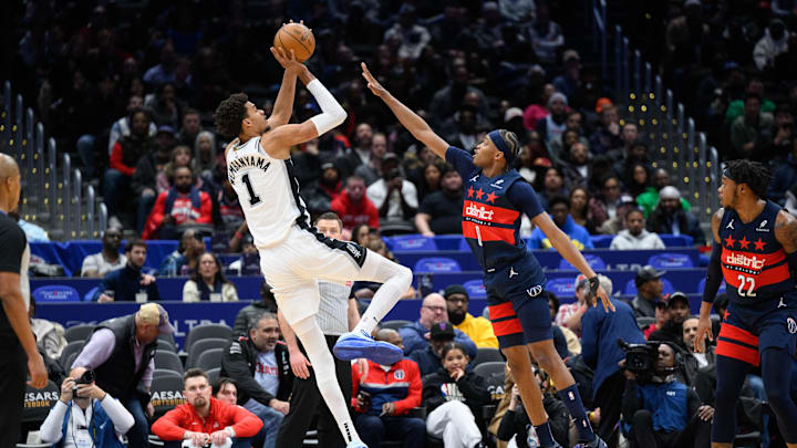 Feb 10, 2025; Washington, District of Columbia, USA; San Antonio Spurs center Victor Wembanyama (1) takes a shot over Washington Wizards guard Bilal Coulibaly (0) during the first quarter at Capital One Arena. Mandatory Credit: Reggie Hildred-Imagn Images Feb 10, 2025; Washington, District of Columbia, USA; San Antonio Spurs center Victor Wembanyama (1) takes a shot over Washington Wizards guard Bilal Coulibaly (0) during the first quarter at Capital One Arena. Mandatory Credit: Reggie Hildred-Imagn Images
